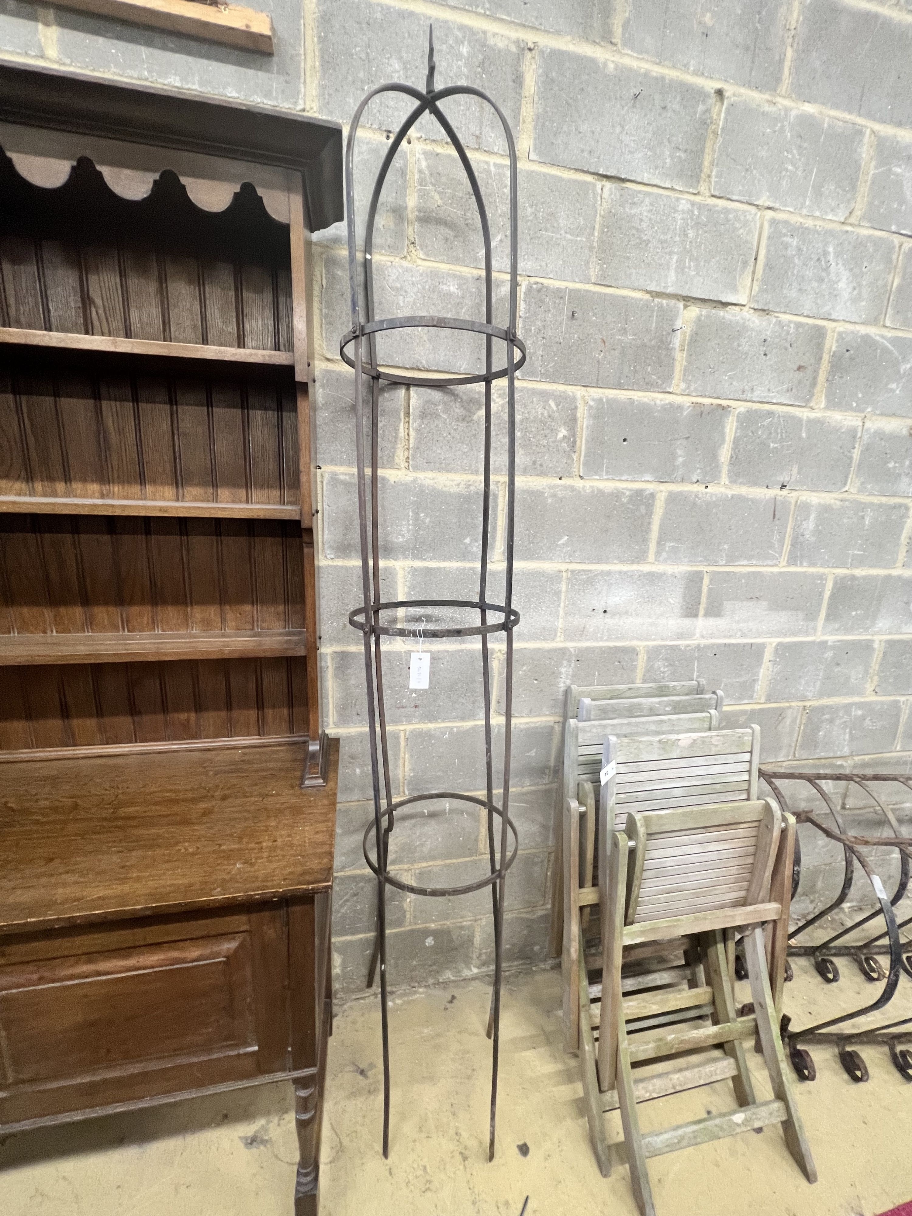 A circular wrought iron garden growing frame, height 246cm